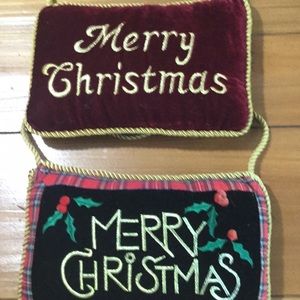 2 hanging holiday pillows.